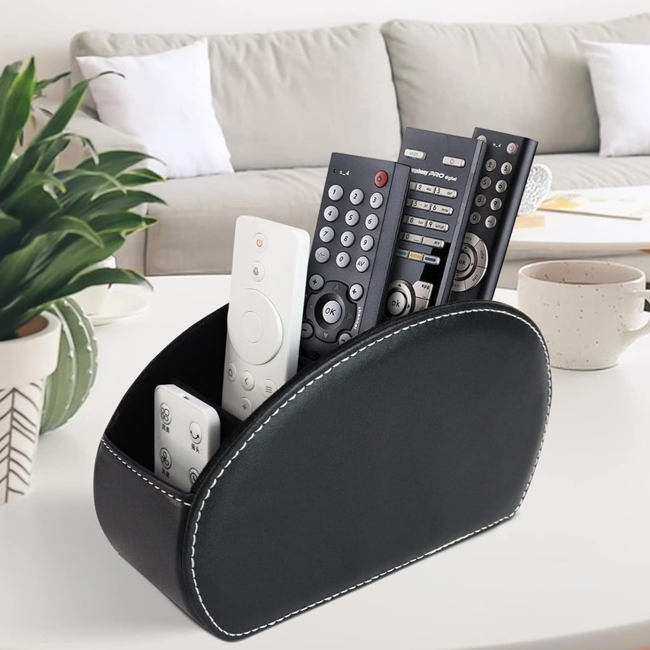 Suport organizator pentru telecomenzi, Zola, 5 spatii, piele ecologica, 22 x 7.2 x 12 cm, negru Suport organizator pentru telecomenzi, Zola, 5 spatii, piele ecologica, 22 x 7.2 x 12 cm, negru
